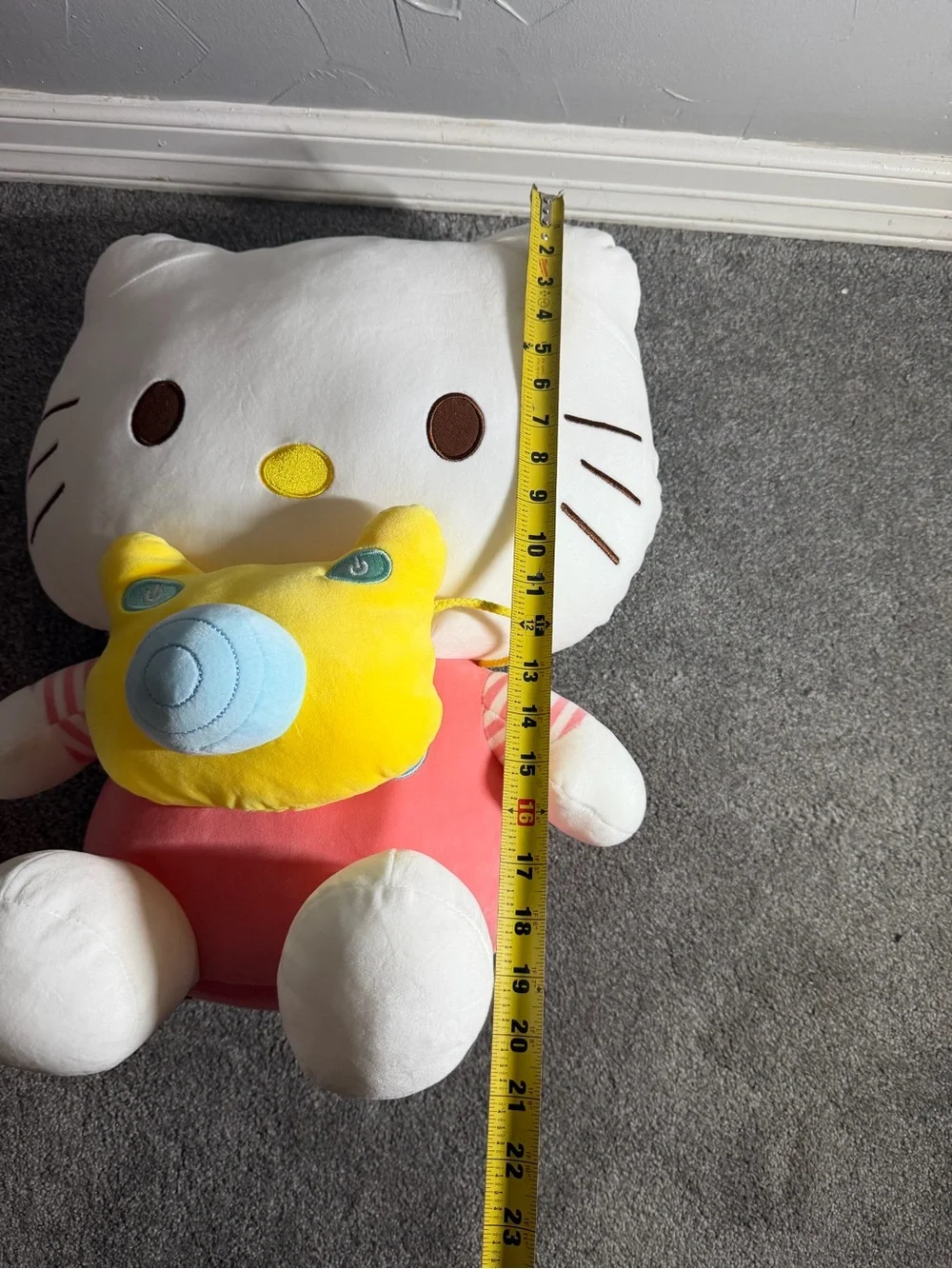 Jumbo sario hello kitty plush pink stripped shirt with yellow camera crossbody